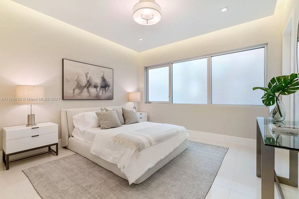 The Miami Beach Home is a stunning new modern construction estate in the esteemed gated Oceanfront community, Altos Del Mar. now available for sale. This house located at 7833 Atlantic Way, Miami Beach, Florida