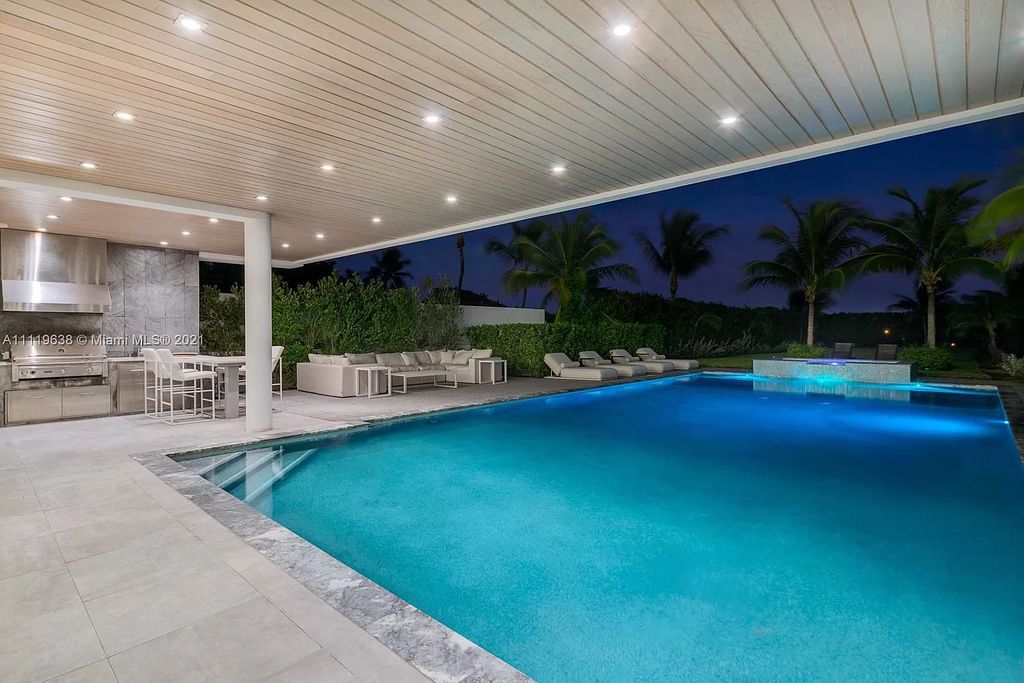 The Miami Beach Home is a stunning new modern construction estate in the esteemed gated Oceanfront community, Altos Del Mar. now available for sale. This house located at 7833 Atlantic Way, Miami Beach, Florida