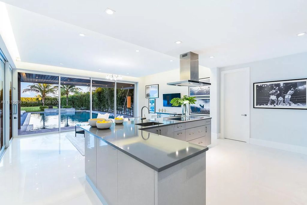 The Miami Beach Home is a stunning new modern construction estate in the esteemed gated Oceanfront community, Altos Del Mar. now available for sale. This house located at 7833 Atlantic Way, Miami Beach, Florida