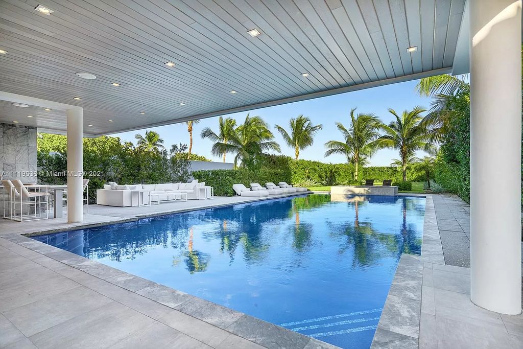 The Miami Beach Home is a stunning new modern construction estate in the esteemed gated Oceanfront community, Altos Del Mar. now available for sale. This house located at 7833 Atlantic Way, Miami Beach, Florida