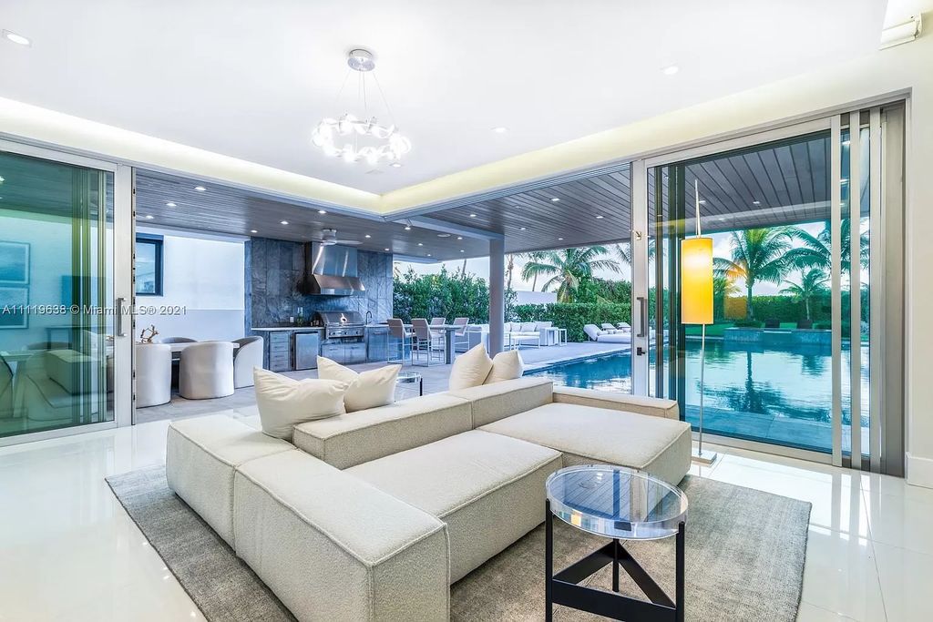 The Miami Beach Home is a stunning new modern construction estate in the esteemed gated Oceanfront community, Altos Del Mar. now available for sale. This house located at 7833 Atlantic Way, Miami Beach, Florida