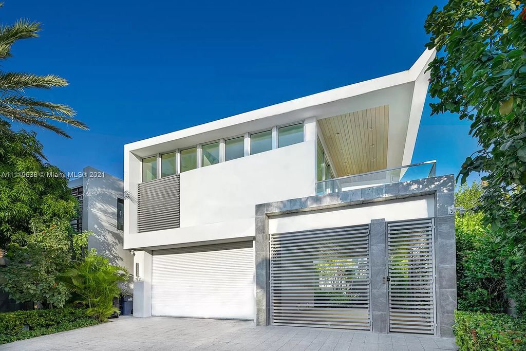 The Miami Beach Home is a stunning new modern construction estate in the esteemed gated Oceanfront community, Altos Del Mar. now available for sale. This house located at 7833 Atlantic Way, Miami Beach, Florida