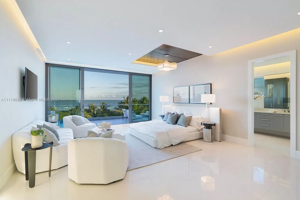 The Miami Beach Home is a stunning new modern construction estate in the esteemed gated Oceanfront community, Altos Del Mar. now available for sale. This house located at 7833 Atlantic Way, Miami Beach, Florida