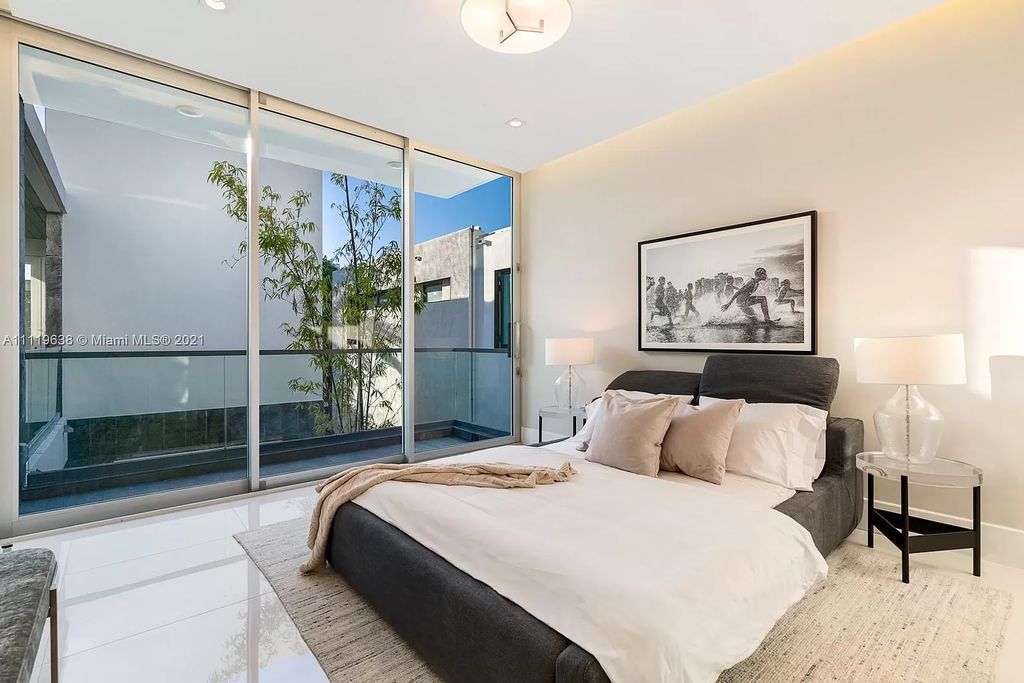 The Miami Beach Home is a stunning new modern construction estate in the esteemed gated Oceanfront community, Altos Del Mar. now available for sale. This house located at 7833 Atlantic Way, Miami Beach, Florida