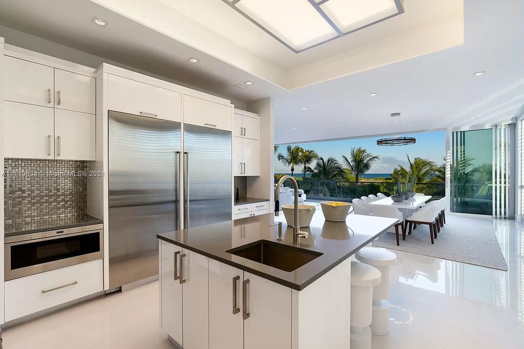 The Miami Beach Home is a stunning new modern construction estate in the esteemed gated Oceanfront community, Altos Del Mar. now available for sale. This house located at 7833 Atlantic Way, Miami Beach, Florida