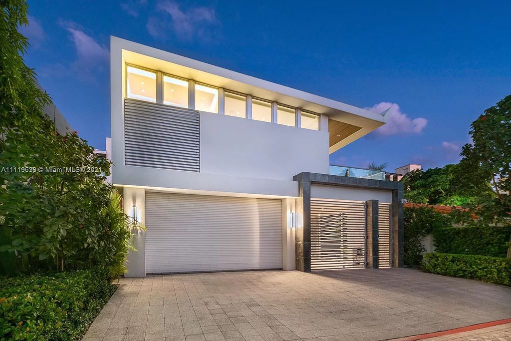 The Miami Beach Home is a stunning new modern construction estate in the esteemed gated Oceanfront community, Altos Del Mar. now available for sale. This house located at 7833 Atlantic Way, Miami Beach, Florida