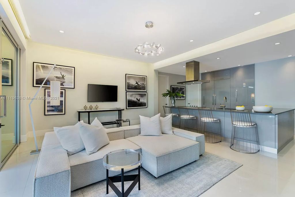 The Miami Beach Home is a stunning new modern construction estate in the esteemed gated Oceanfront community, Altos Del Mar. now available for sale. This house located at 7833 Atlantic Way, Miami Beach, Florida