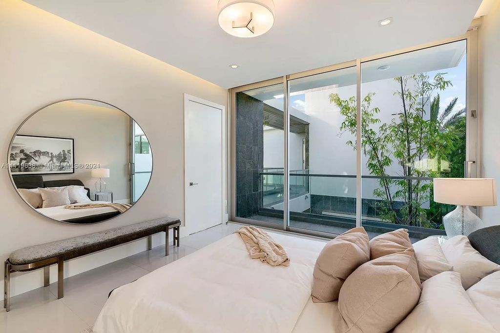 The Miami Beach Home is a stunning new modern construction estate in the esteemed gated Oceanfront community, Altos Del Mar. now available for sale. This house located at 7833 Atlantic Way, Miami Beach, Florida