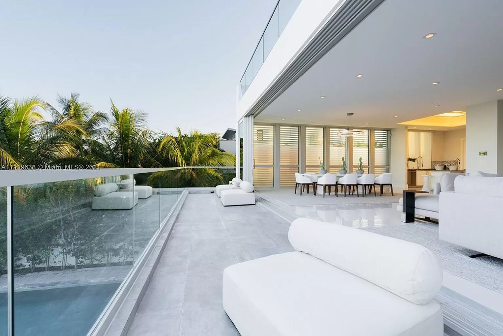 The Miami Beach Home is a stunning new modern construction estate in the esteemed gated Oceanfront community, Altos Del Mar. now available for sale. This house located at 7833 Atlantic Way, Miami Beach, Florida