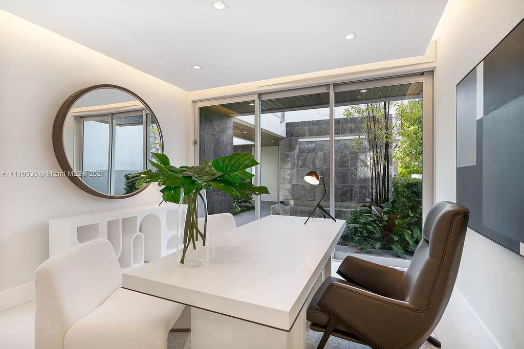 The Miami Beach Home is a stunning new modern construction estate in the esteemed gated Oceanfront community, Altos Del Mar. now available for sale. This house located at 7833 Atlantic Way, Miami Beach, Florida