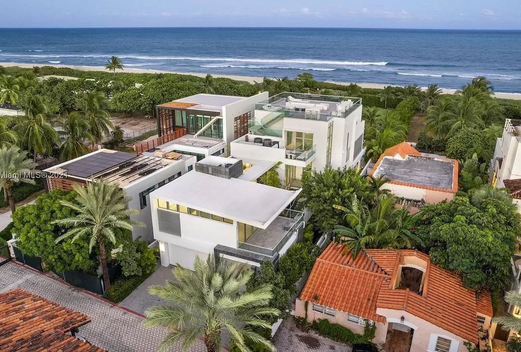 The Miami Beach Home is a stunning new modern construction estate in the esteemed gated Oceanfront community, Altos Del Mar. now available for sale. This house located at 7833 Atlantic Way, Miami Beach, Florida