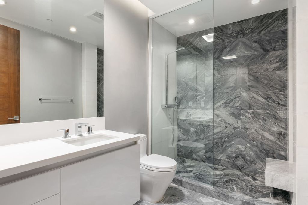 The Home in Beverly Hills is a contemporary masterpiece is built with soaring ceilings, clean lines, and sleek intricacies now available for sale. This home located at 1041 N Hillcrest Rd, Beverly Hills, California