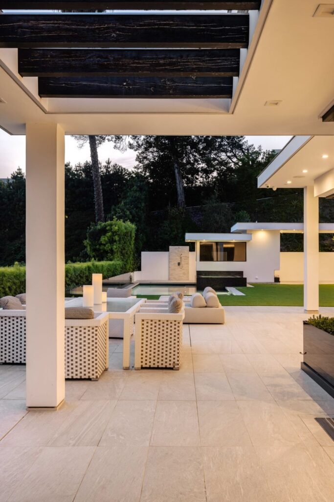 The Home in Beverly Hills is a contemporary masterpiece is built with soaring ceilings, clean lines, and sleek intricacies now available for sale. This home located at 1041 N Hillcrest Rd, Beverly Hills, California
