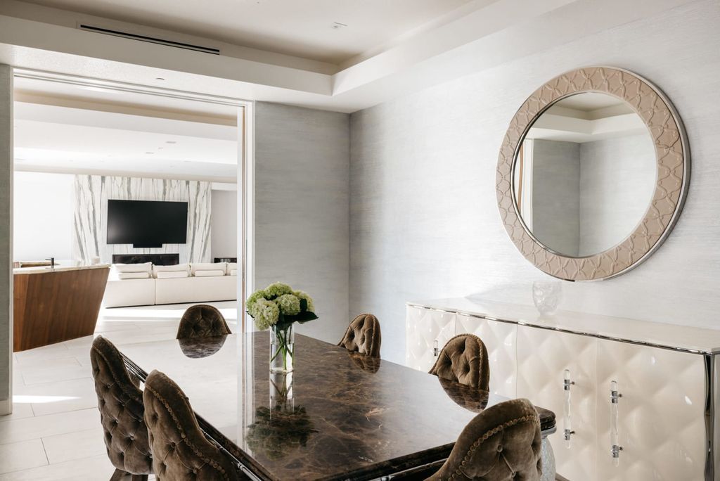 The Home in Beverly Hills is a contemporary masterpiece is built with soaring ceilings, clean lines, and sleek intricacies now available for sale. This home located at 1041 N Hillcrest Rd, Beverly Hills, California