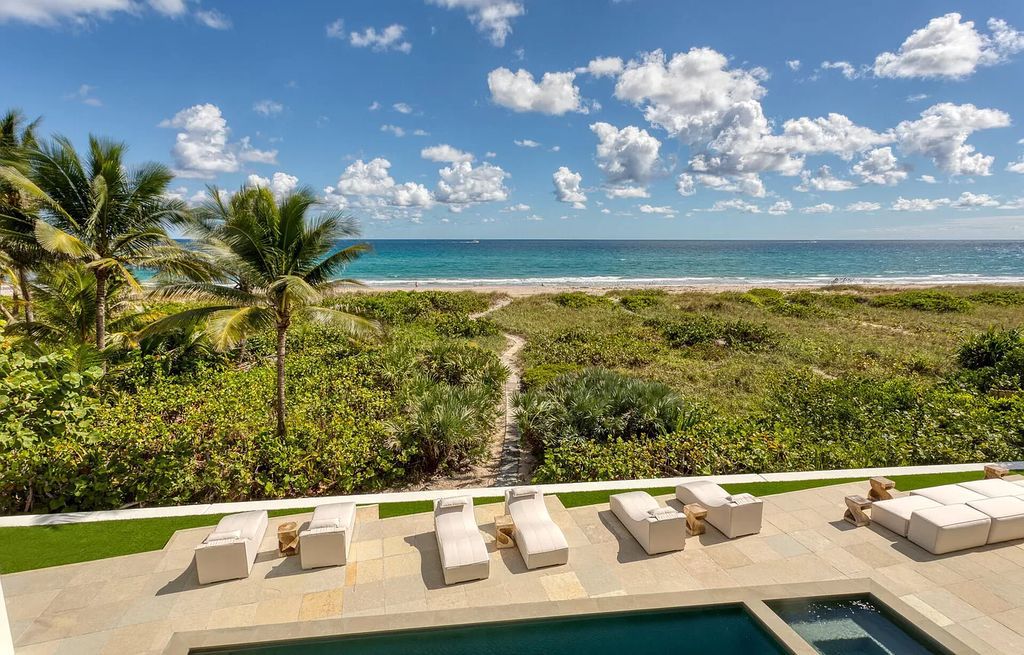 The Home in Delray Beach is sited on lushly landscaped half acre with 110+/- feet directly on the oceanfront now available for sale. This property located at 711 N Ocean Blvd, Delray Beach, Florida