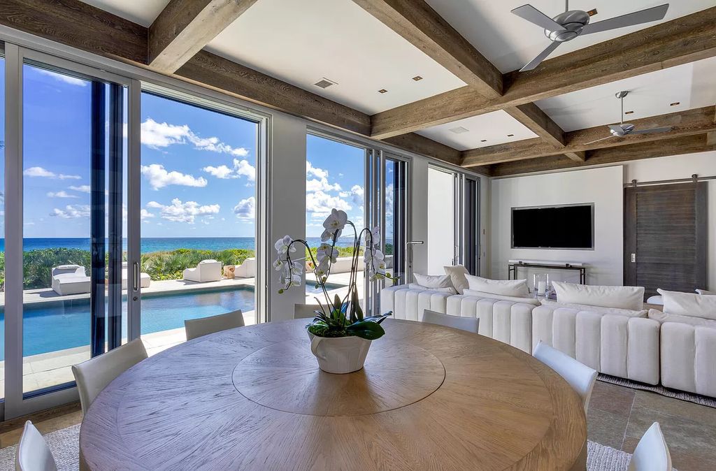 The Home in Delray Beach is sited on lushly landscaped half acre with 110+/- feet directly on the oceanfront now available for sale. This property located at 711 N Ocean Blvd, Delray Beach, Florida