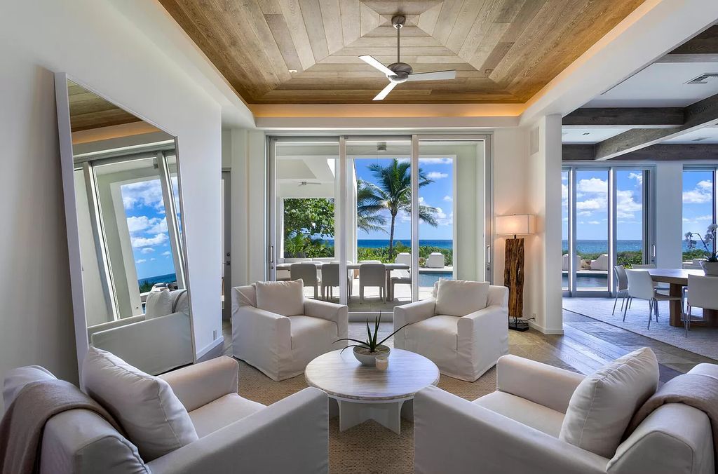 The Home in Delray Beach is sited on lushly landscaped half acre with 110+/- feet directly on the oceanfront now available for sale. This property located at 711 N Ocean Blvd, Delray Beach, Florida