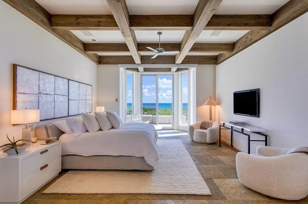 The Home in Delray Beach is sited on lushly landscaped half acre with 110+/- feet directly on the oceanfront now available for sale. This property located at 711 N Ocean Blvd, Delray Beach, Florida