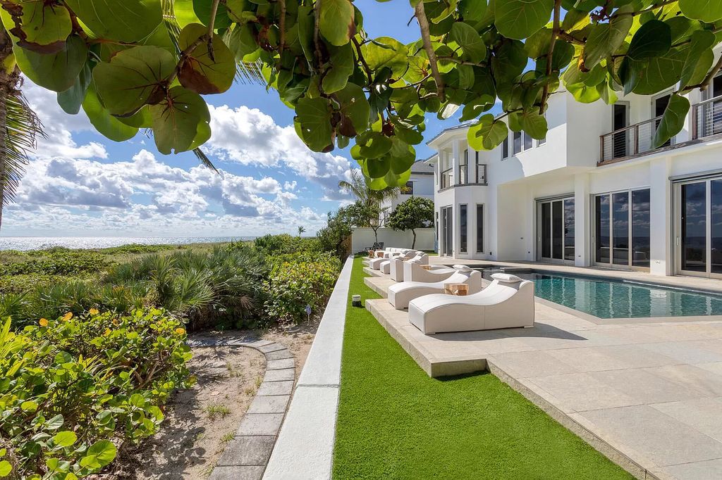 The Home in Delray Beach is sited on lushly landscaped half acre with 110+/- feet directly on the oceanfront now available for sale. This property located at 711 N Ocean Blvd, Delray Beach, Florida
