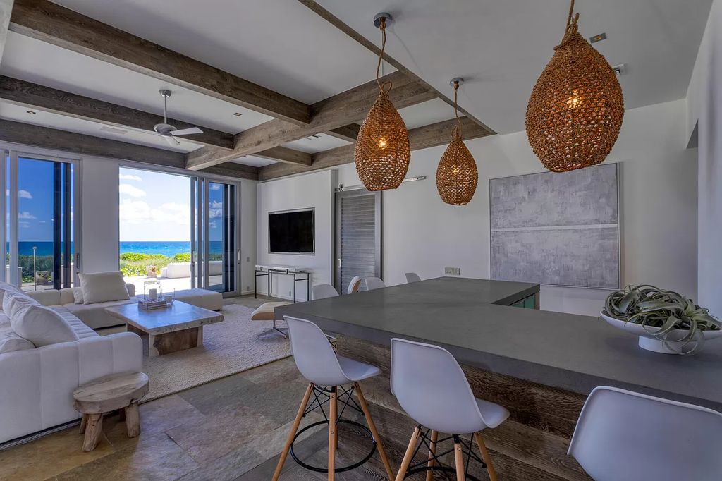 The Home in Delray Beach is sited on lushly landscaped half acre with 110+/- feet directly on the oceanfront now available for sale. This property located at 711 N Ocean Blvd, Delray Beach, Florida