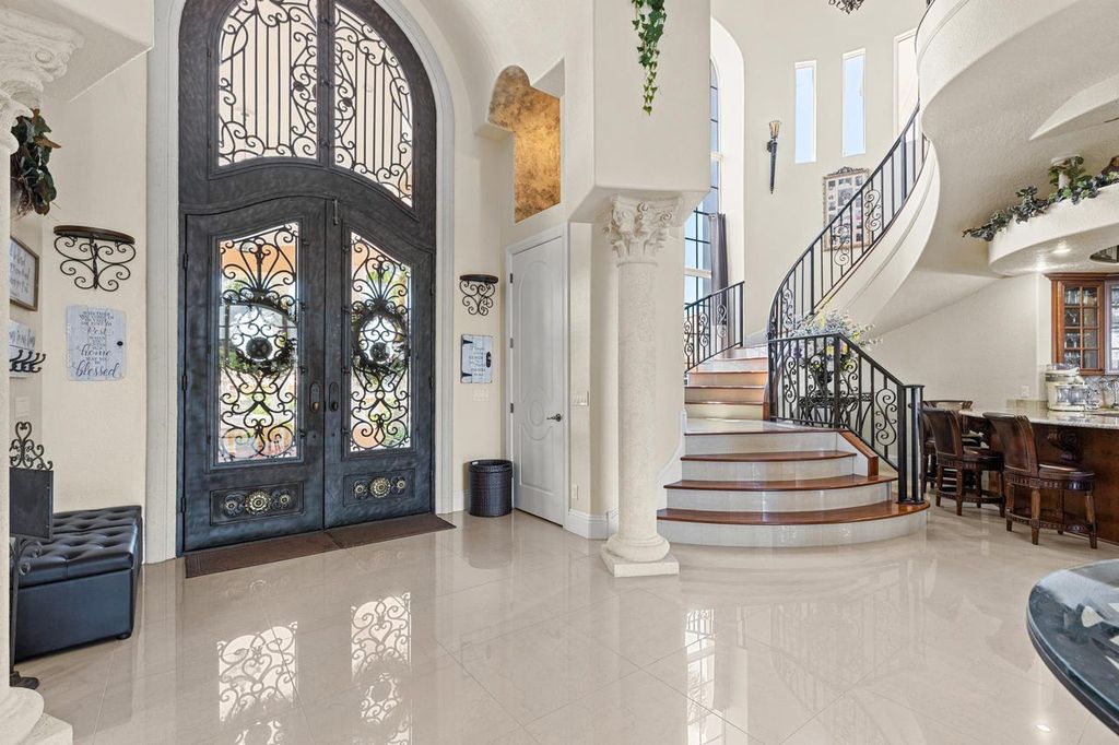 The Home in Merritt Island is a majestic estate home high on a bluff overlooking three bodies of water with stunning panoramic views now available for sale. This home located at 5030 Valle Collina Ln, Merritt Island, Florida