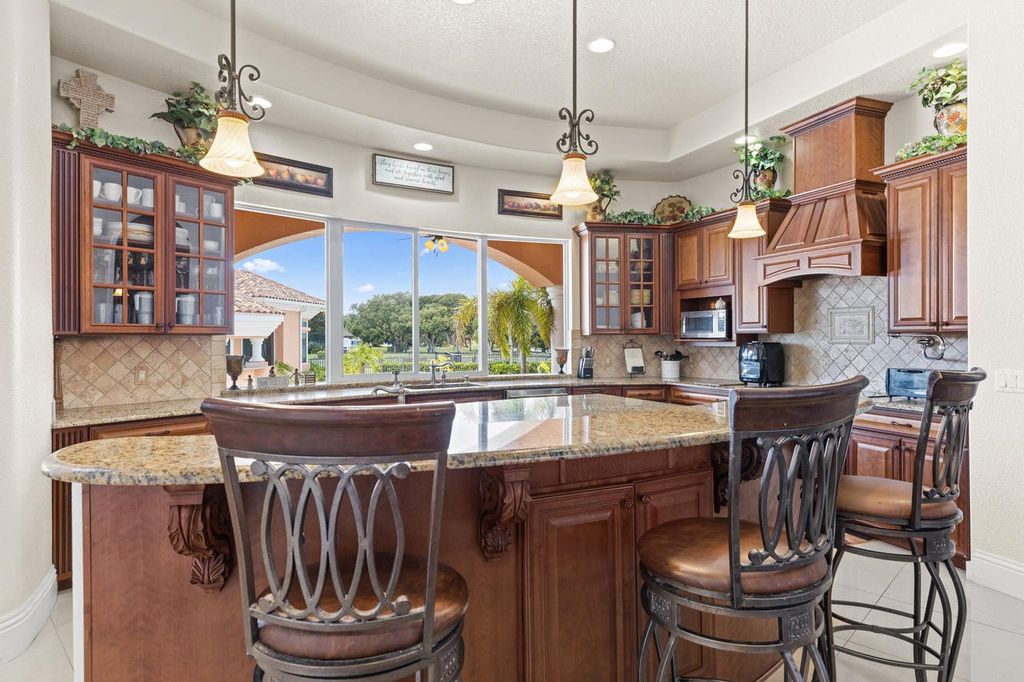 The Home in Merritt Island is a majestic estate home high on a bluff overlooking three bodies of water with stunning panoramic views now available for sale. This home located at 5030 Valle Collina Ln, Merritt Island, Florida
