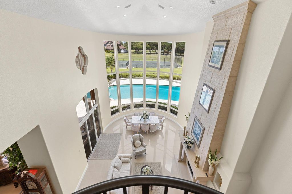 The Home in Merritt Island is a majestic estate home high on a bluff overlooking three bodies of water with stunning panoramic views now available for sale. This home located at 5030 Valle Collina Ln, Merritt Island, Florida