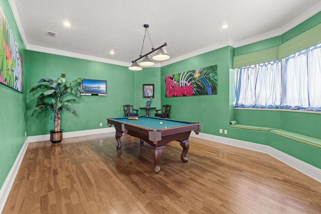 The Home in Merritt Island is a majestic estate home high on a bluff overlooking three bodies of water with stunning panoramic views now available for sale. This home located at 5030 Valle Collina Ln, Merritt Island, Florida