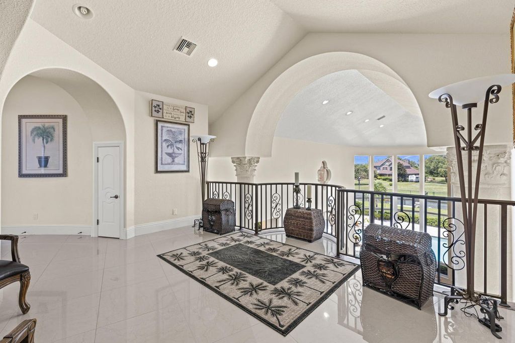 The Home in Merritt Island is a majestic estate home high on a bluff overlooking three bodies of water with stunning panoramic views now available for sale. This home located at 5030 Valle Collina Ln, Merritt Island, Florida
