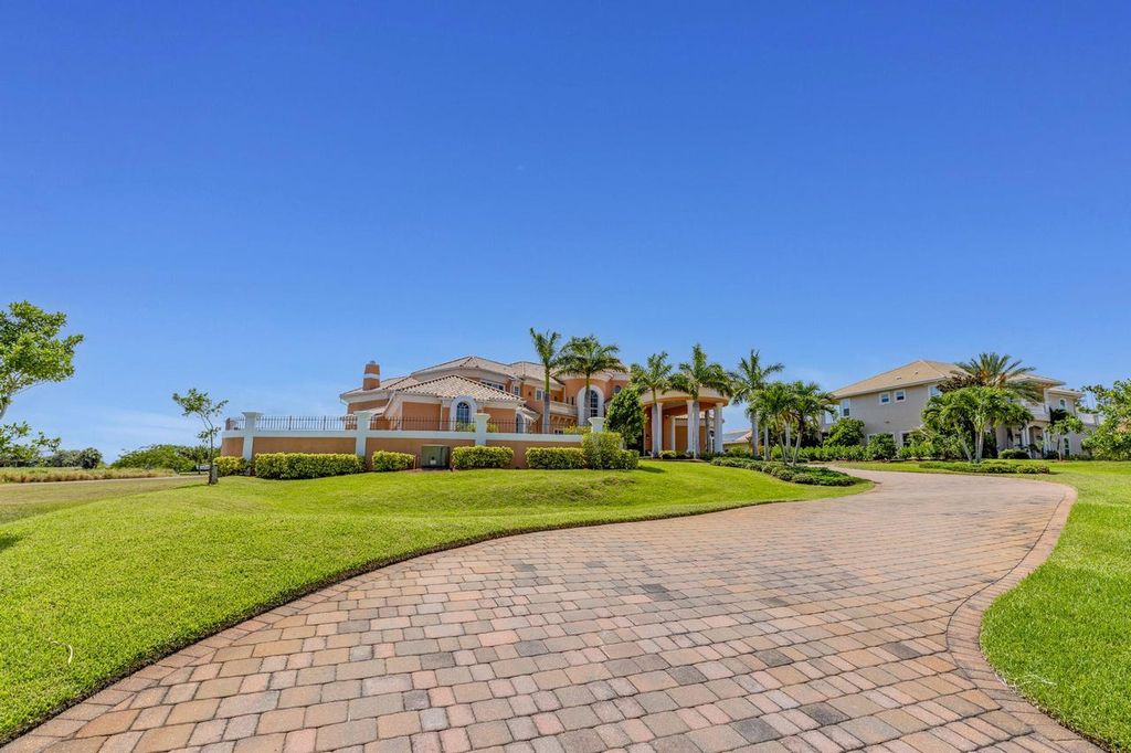 The Home in Merritt Island is a majestic estate home high on a bluff overlooking three bodies of water with stunning panoramic views now available for sale. This home located at 5030 Valle Collina Ln, Merritt Island, Florida