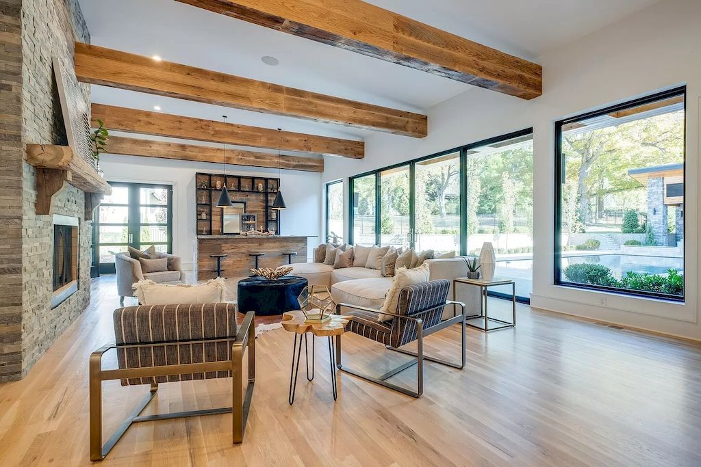 The Tennessee Home is a luxurious home on 2 acres featuring sophisticated lighting, oversized windows and a jaw-dropping pool now available for sale. This home located at 5026 Franklin Pike, Nashville, Tennessee; offering 06 bedrooms and 13 bathrooms with 14,021 square feet of living spaces.