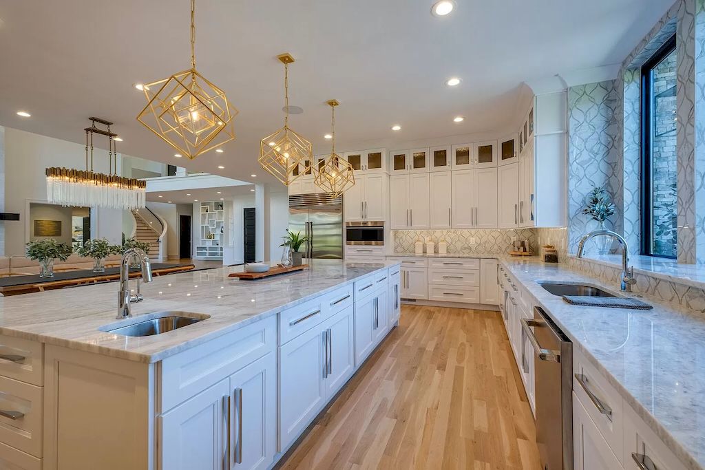 The Tennessee Home is a luxurious home on 2 acres featuring sophisticated lighting, oversized windows and a jaw-dropping pool now available for sale. This home located at 5026 Franklin Pike, Nashville, Tennessee; offering 06 bedrooms and 13 bathrooms with 14,021 square feet of living spaces.