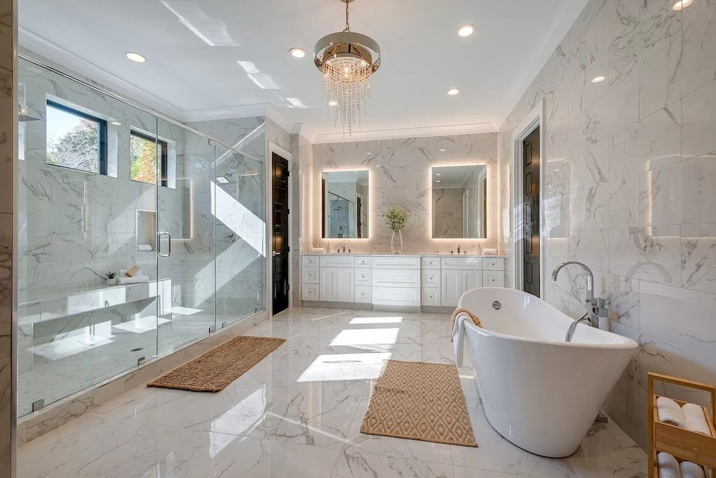 The Tennessee Home is a luxurious home on 2 acres featuring sophisticated lighting, oversized windows and a jaw-dropping pool now available for sale. This home located at 5026 Franklin Pike, Nashville, Tennessee; offering 06 bedrooms and 13 bathrooms with 14,021 square feet of living spaces.