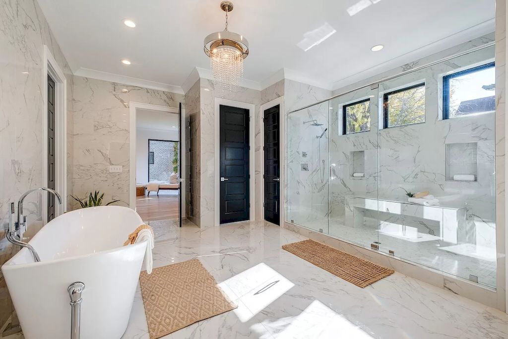 The Tennessee Home is a luxurious home on 2 acres featuring sophisticated lighting, oversized windows and a jaw-dropping pool now available for sale. This home located at 5026 Franklin Pike, Nashville, Tennessee; offering 06 bedrooms and 13 bathrooms with 14,021 square feet of living spaces.