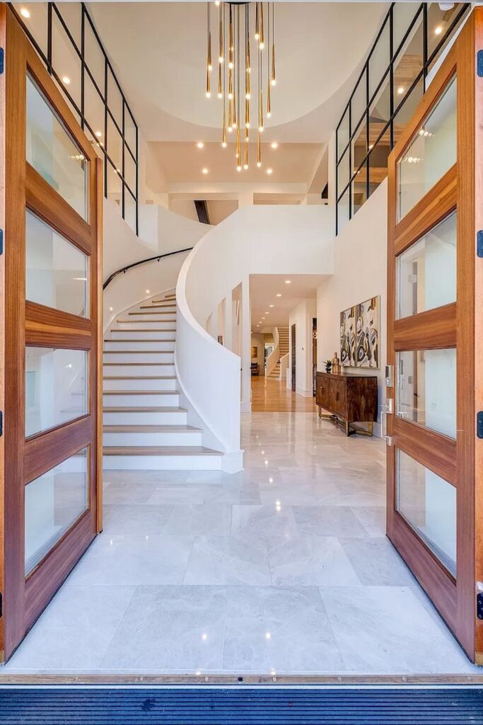 The Tennessee Home is a luxurious home on 2 acres featuring sophisticated lighting, oversized windows and a jaw-dropping pool now available for sale. This home located at 5026 Franklin Pike, Nashville, Tennessee; offering 06 bedrooms and 13 bathrooms with 14,021 square feet of living spaces.