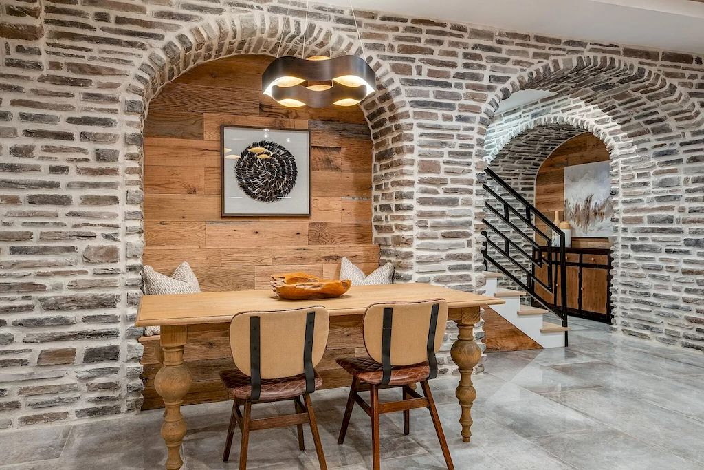 The Tennessee Home is a luxurious home on 2 acres featuring sophisticated lighting, oversized windows and a jaw-dropping pool now available for sale. This home located at 5026 Franklin Pike, Nashville, Tennessee; offering 06 bedrooms and 13 bathrooms with 14,021 square feet of living spaces.