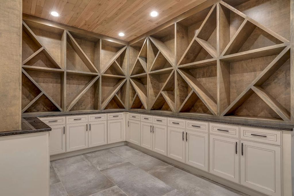 The Tennessee Home is a luxurious home on 2 acres featuring sophisticated lighting, oversized windows and a jaw-dropping pool now available for sale. This home located at 5026 Franklin Pike, Nashville, Tennessee; offering 06 bedrooms and 13 bathrooms with 14,021 square feet of living spaces.