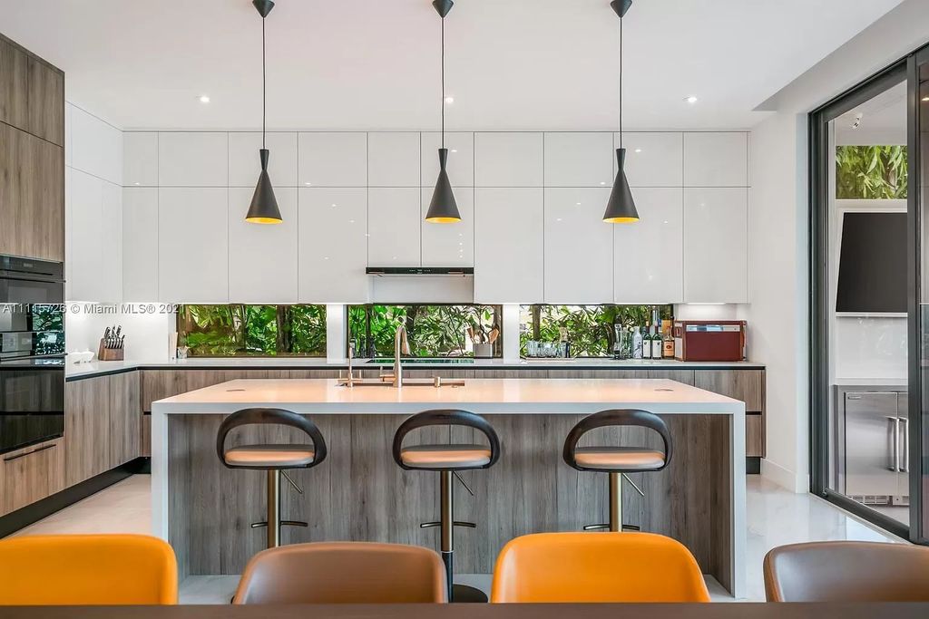 The Home in Miami is a tropical modern estate built with top level finish with breathtaking open floor plan of living spaces now available for sale. This home located at 7333 Belle Meade Blvd, Miami, Florida