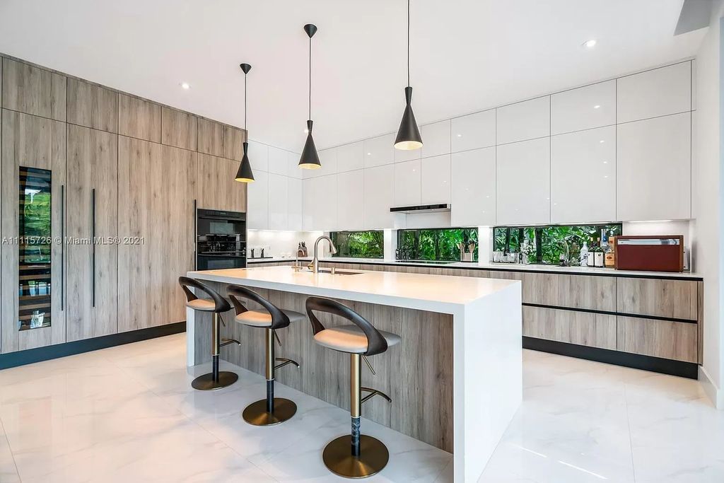 The Home in Miami is a tropical modern estate built with top level finish with breathtaking open floor plan of living spaces now available for sale. This home located at 7333 Belle Meade Blvd, Miami, Florida