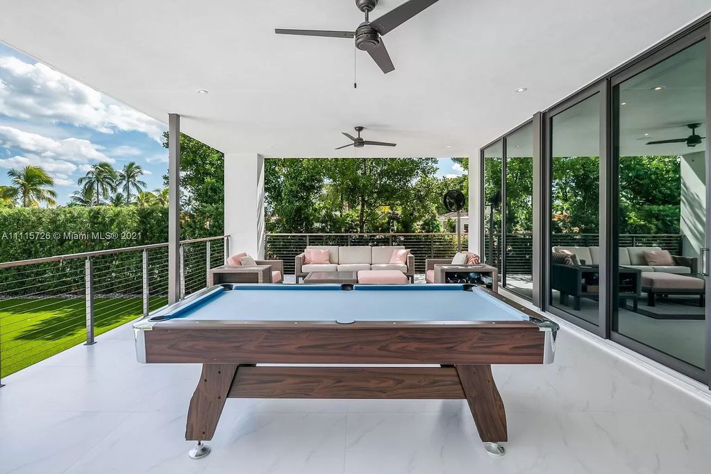 The Home in Miami is a tropical modern estate built with top level finish with breathtaking open floor plan of living spaces now available for sale. This home located at 7333 Belle Meade Blvd, Miami, Florida