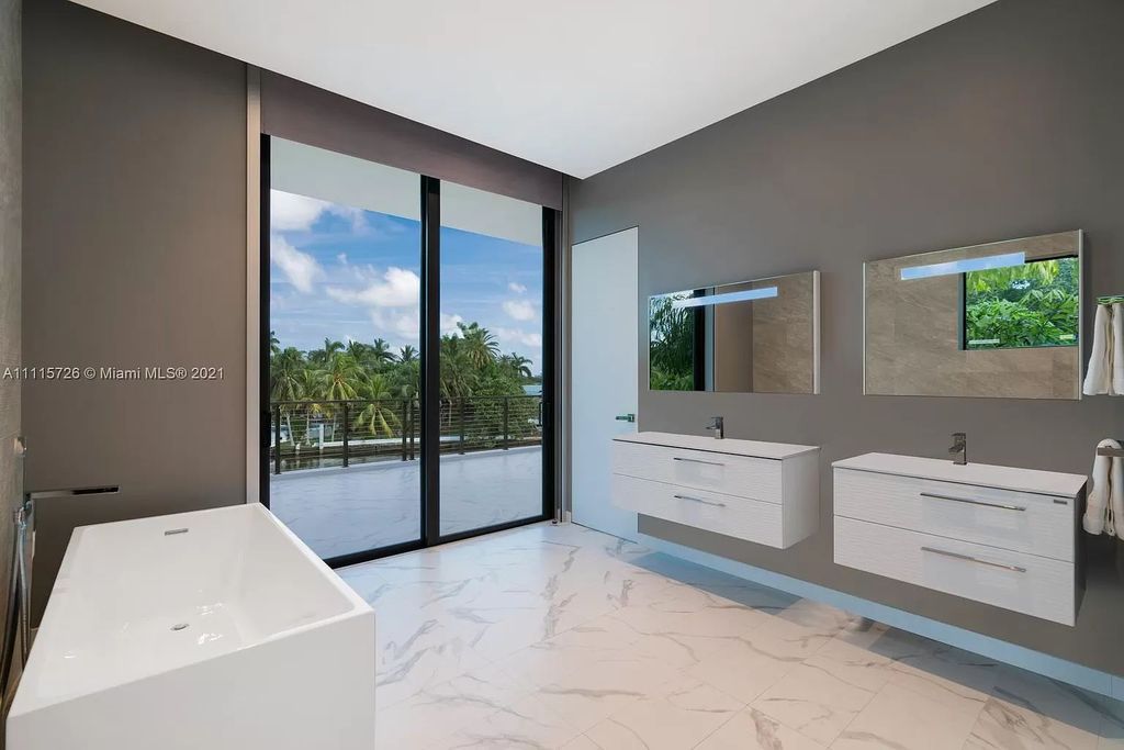 The Home in Miami is a tropical modern estate built with top level finish with breathtaking open floor plan of living spaces now available for sale. This home located at 7333 Belle Meade Blvd, Miami, Florida