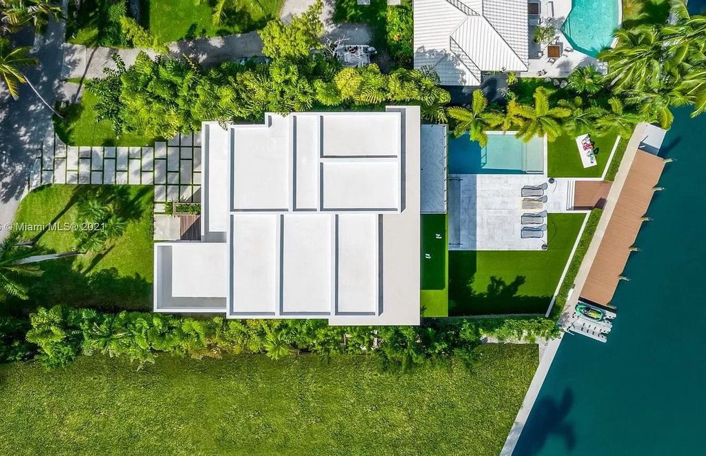 The Home in Miami is a tropical modern estate built with top level finish with breathtaking open floor plan of living spaces now available for sale. This home located at 7333 Belle Meade Blvd, Miami, Florida