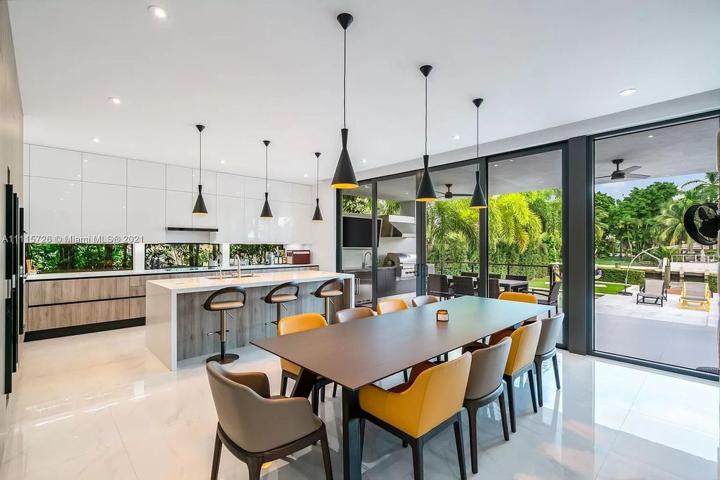 The Home in Miami is a tropical modern estate built with top level finish with breathtaking open floor plan of living spaces now available for sale. This home located at 7333 Belle Meade Blvd, Miami, Florida
