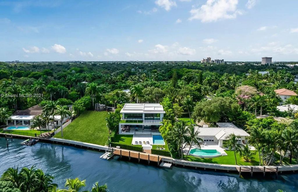 The Home in Miami is a tropical modern estate built with top level finish with breathtaking open floor plan of living spaces now available for sale. This home located at 7333 Belle Meade Blvd, Miami, Florida
