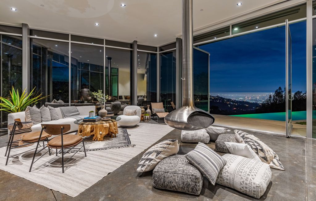 The Los Angeles Home is a hilltop sanctuary nestled on 1.5 picturesque acres perched above Laurel Canyon and built by AIA award-winning architect Hagy Belzberg now available for sale. This home located at 8520 Skyline Dr, Los Angeles, California