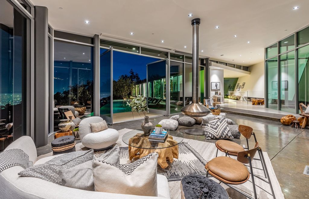 The Los Angeles Home is a hilltop sanctuary nestled on 1.5 picturesque acres perched above Laurel Canyon and built by AIA award-winning architect Hagy Belzberg now available for sale. This home located at 8520 Skyline Dr, Los Angeles, California