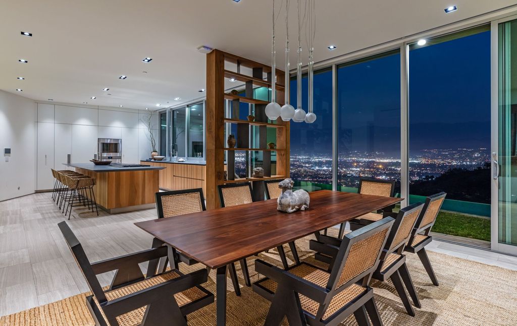 The Los Angeles Home is a hilltop sanctuary nestled on 1.5 picturesque acres perched above Laurel Canyon and built by AIA award-winning architect Hagy Belzberg now available for sale. This home located at 8520 Skyline Dr, Los Angeles, California
