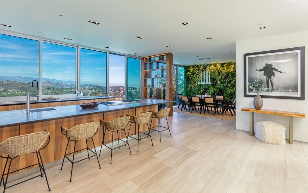 The Los Angeles Home is a hilltop sanctuary nestled on 1.5 picturesque acres perched above Laurel Canyon and built by AIA award-winning architect Hagy Belzberg now available for sale. This home located at 8520 Skyline Dr, Los Angeles, California