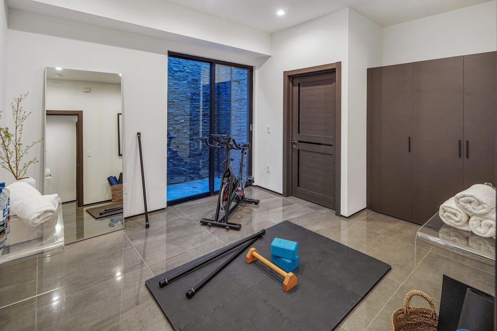 The Home in Beverly Grove is a brand-new 2021 geometric modern using an intricate blend of materials and architectural elements now available for sale. This home located at 542 N Vista St, Los Angeles, California