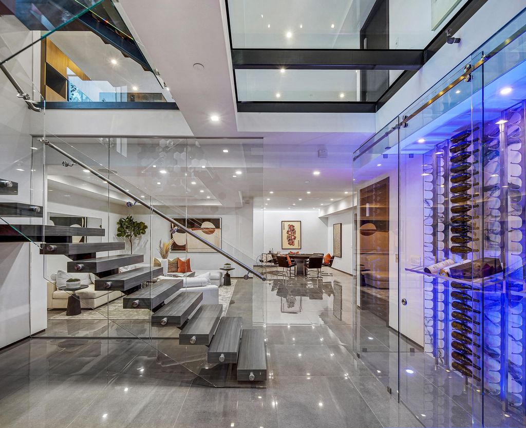The Home in Beverly Grove is a brand-new 2021 geometric modern using an intricate blend of materials and architectural elements now available for sale. This home located at 542 N Vista St, Los Angeles, California